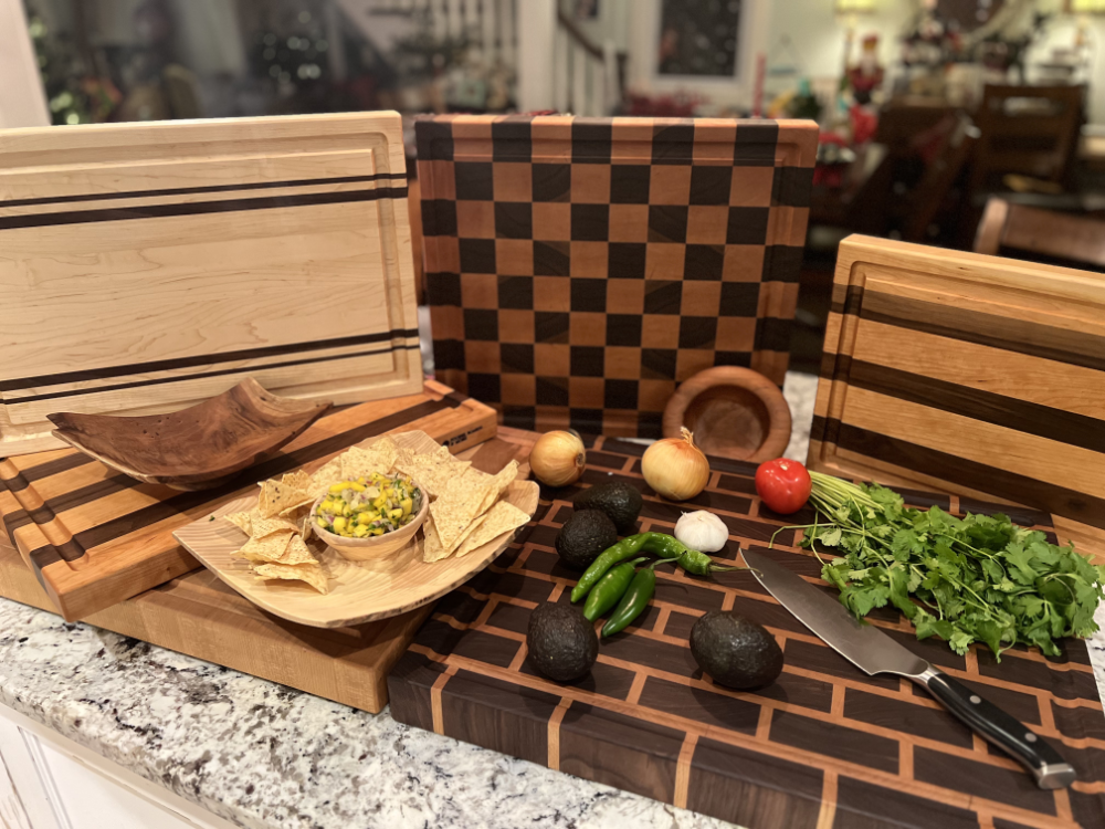 nice wood cutting boards with a display of accouterments